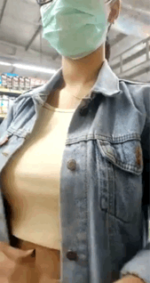 Showing her boobs during social distancing shopping