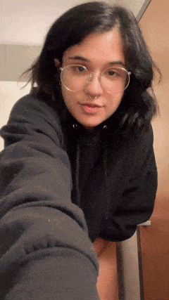 Gif - Cute curvy arab teen with glasses flashes her big tits