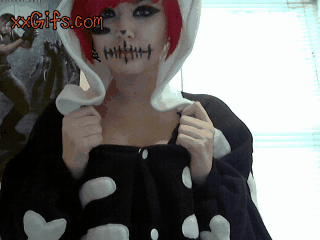 Gif - Halloween red head chick shows her small tits