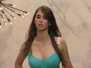 Gif - Hot little bikini-clad model has a pair of hot nubile melons that look so fucking hot jouncing in slow-mo