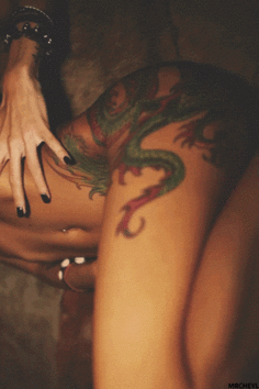 Gif - Hot tattooed dragon gif this girl is naked and show her dragon tattoo on her leg