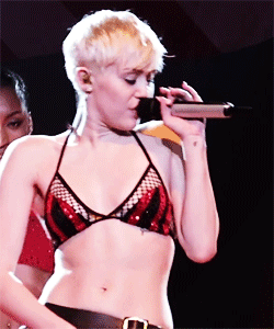 Gif - Miley Cyrus rubbing her cunt on stage
