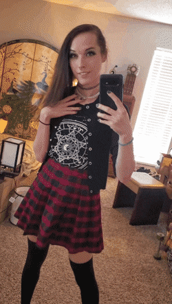 Gif - Smiling above her skirt and below