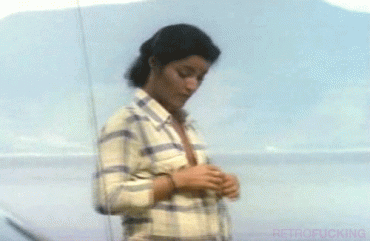Gif - 80's Latina Actress with tanlines and small tits undressing on the beach