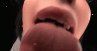 Gif - Asian babe licks camera