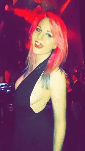 Gif - Babe with pink hair flashing one of her pierced nipples
