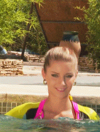 Gif - Massive melons splashing in the pool