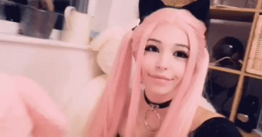 Gif - Belle Delphine pink hair cuddling giant pink stuffie