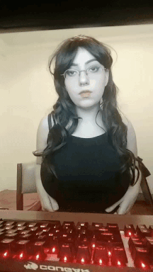 Gif - Gorgeous amateur teen showing off her huge tits again.