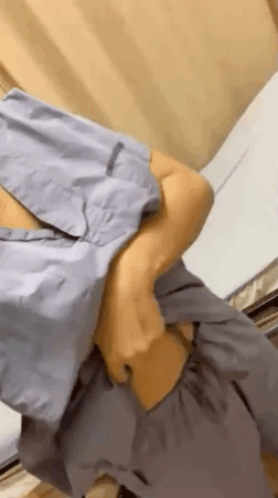Gif - Nurse showing off her great boobs