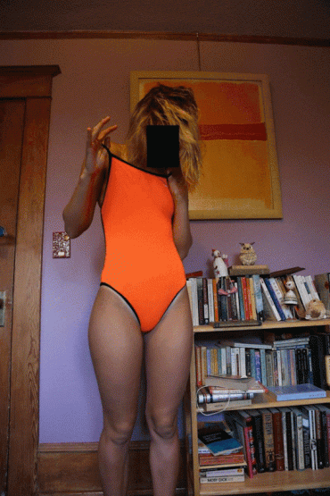Gif - Sexy amateur stripping from one-piece swimsuit