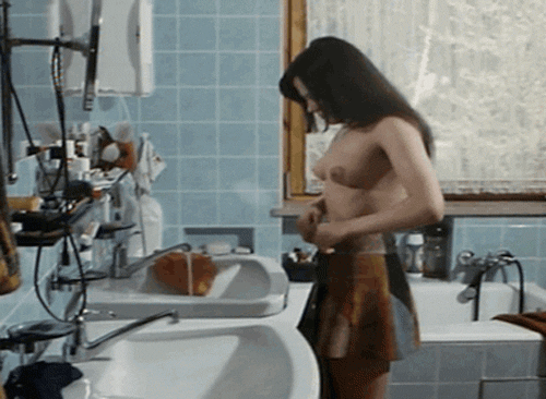 Gif - Vintage Nude Scene with Topless Brunette Teen in the Bathroom Ready for a Bath